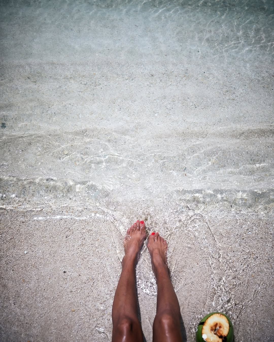 Toes in the sand, coconut in hand; Sundays in JAMAICA don’t get any better than this #VisitJamaica @goldeneye